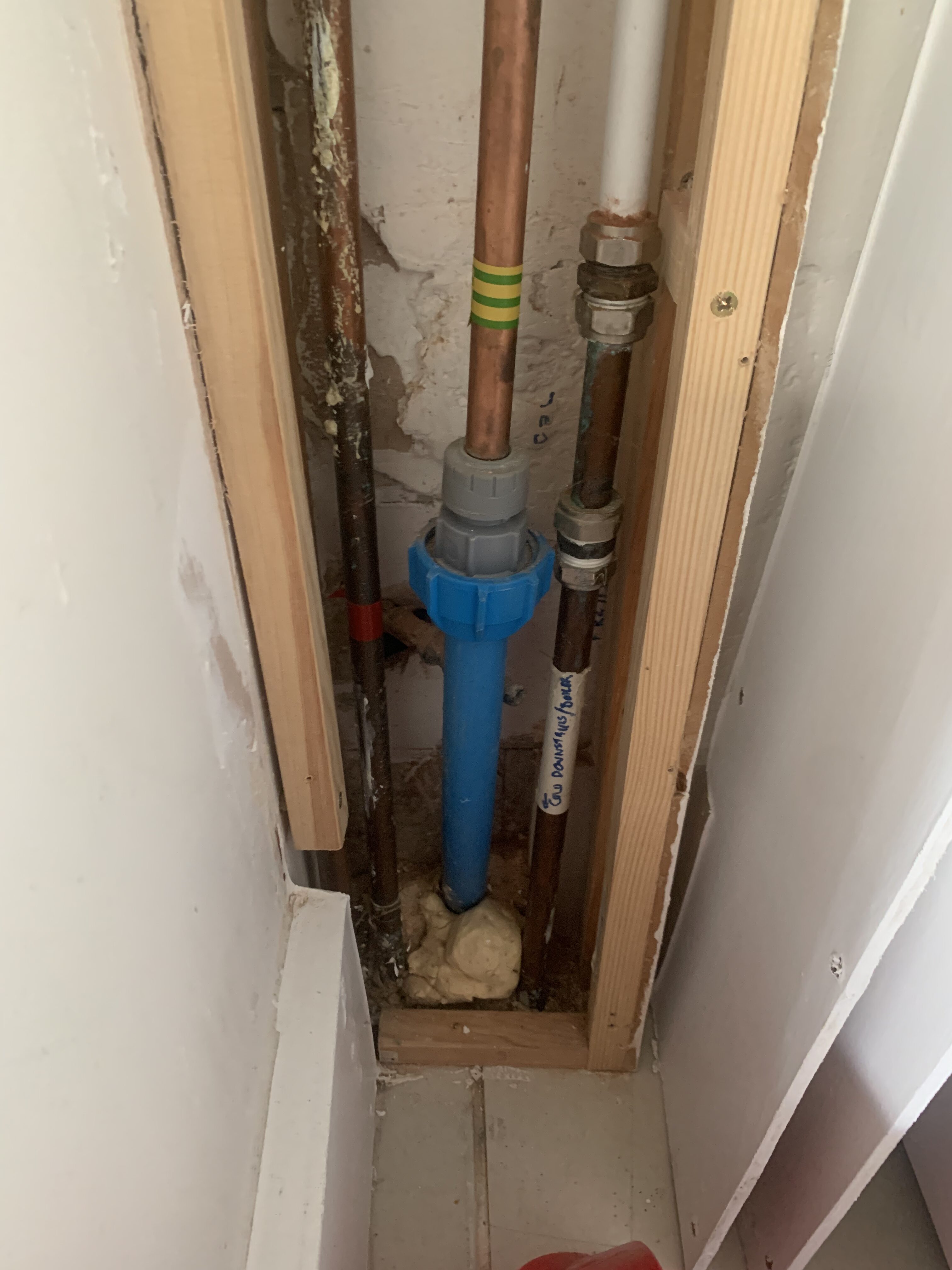 Original 15mm pipe was restricting flow to showers