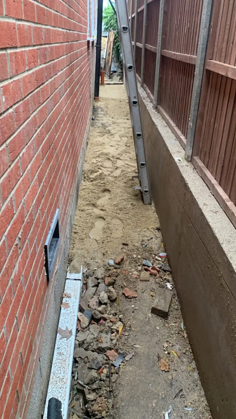 Preparing underground primary pipework to run under the side path