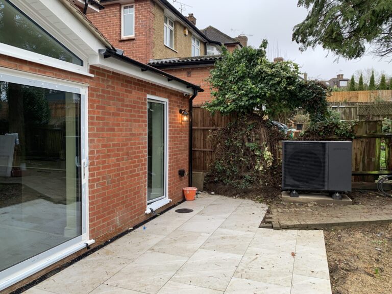 Heat pump in location, (with a new fence and further landscaping to follow)