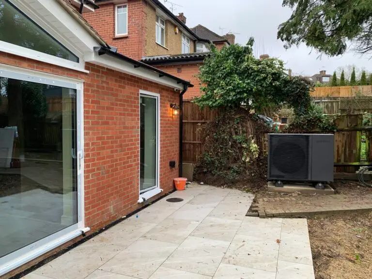 Heat pump in location, (with a new fence and further landscaping to follow)