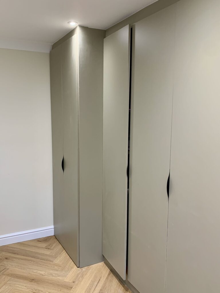 Cupboard fitters concealed the Sunamp and plumbing in a stylish fitted cupboard